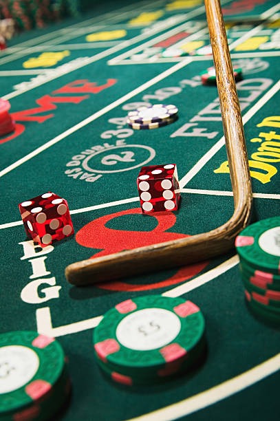 Live roulette wheel at manjur4d with multi-angle camera view and betting interface on screen